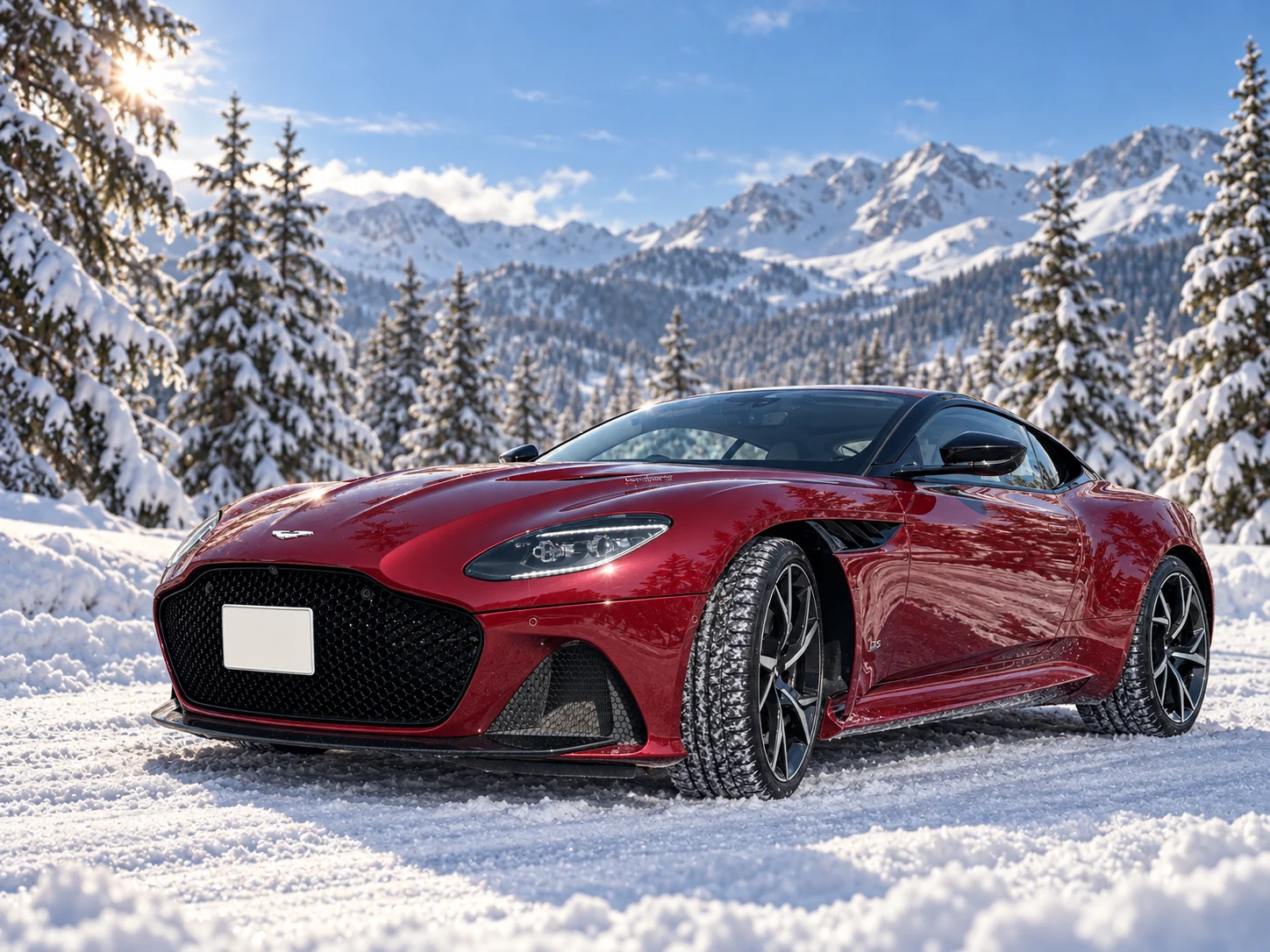 Red Aston Martin surrounded by snow and pine trees